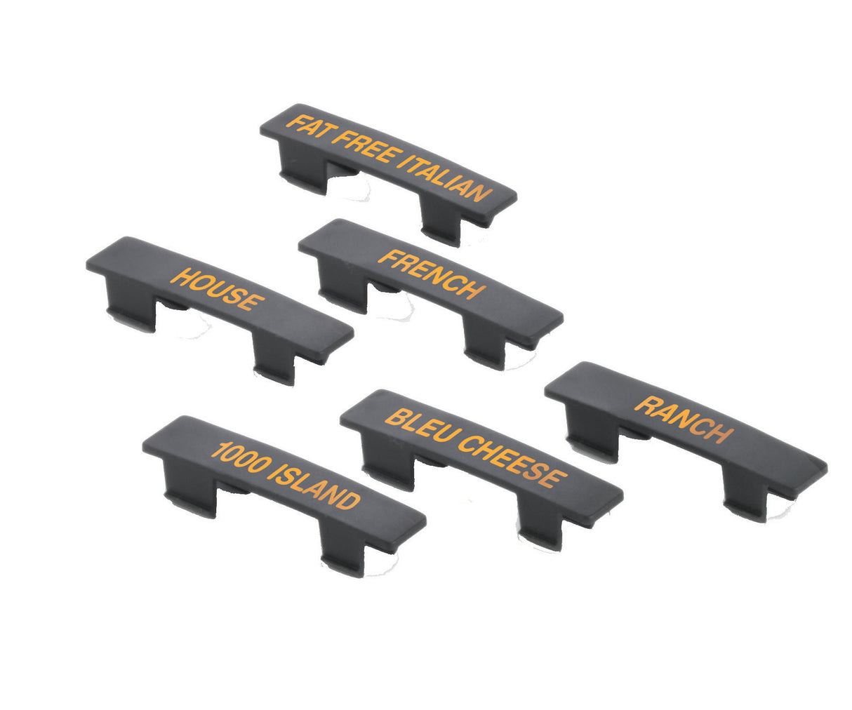 This TableCraft Products name tag set includes six black plastic condiment labels with orange text. Each dishwasher safe label—FAT FREE ITALIAN, HOUSE, FRENCH, BLEU CHEESE, 1000 ISLAND, and RANCH—has clips for easy container attachment.