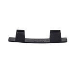 A black, rectangular polypropylene bracket with two raised square sections on each end, viewed from the side against a white background. The smooth surface features slight texture and embossed markings near the center, ensuring it is durable and dishwasher safe.
