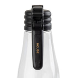 A clear glass bottle with a black flip-top lid made from durable polypropylene. The lid has a wide, ribbed grip and a vertical handle labeled HOUSE in gold capital letters. Shown from the front against a plain white background.