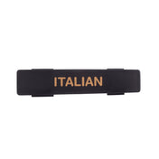 A black rectangular plastic name tag features the word ITALIAN printed in gold capital letters at the center. Dishwasher safe, it is photographed from above against a plain white background.