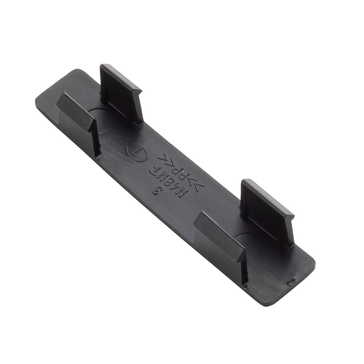 A black plastic rectangular clip made from polypropylene with four upright tabs, indented markings including arrows and “PP+GF15” and “A6-5NT.” The smooth surface features slightly raised edges, small protrusions, and is dishwasher safe.