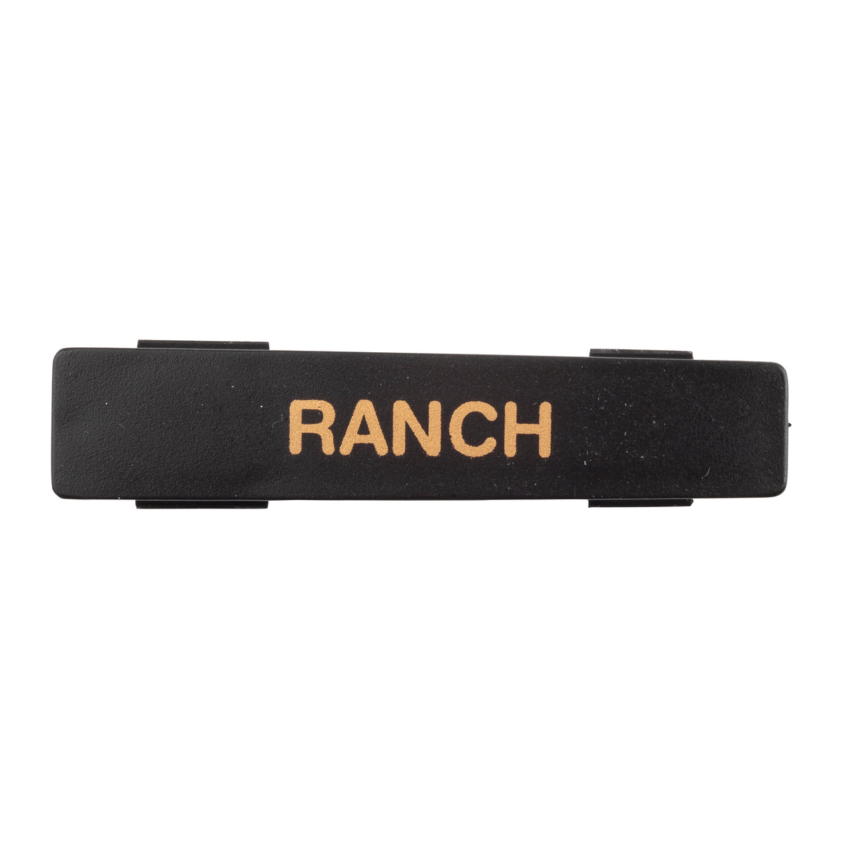 A black rectangular Ranch name tag label with the word RANCH in bold, uppercase, tan letters. Made from dishwasher safe polypropylene, it has clips or tabs on each side and is set against a plain white background.
