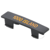A black plastic keyboard key with "1000 ISLAND" printed in orange-yellow text on top, designed as a unique name tag. The keycap has two clips underneath for attaching to a keyboard. The background is plain white.