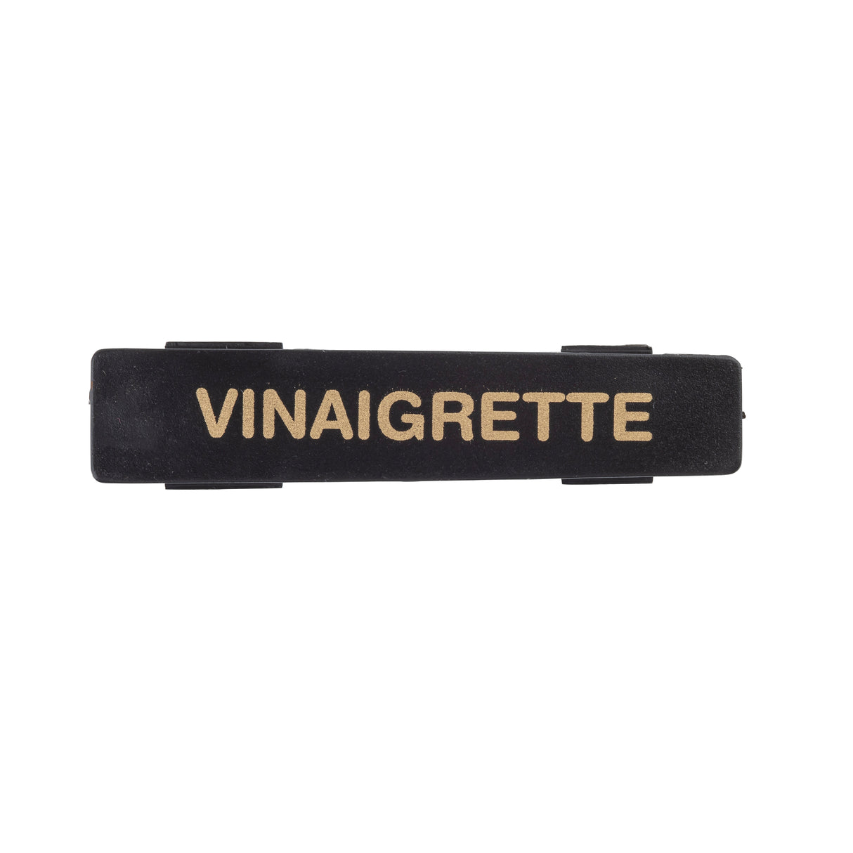 A black rectangular TableCraft name tag features the word VINAIGRETTE in bold, uppercase, gold letters centered on it. The label has small, raised tabs on its top and bottom edges against a plain white background.
