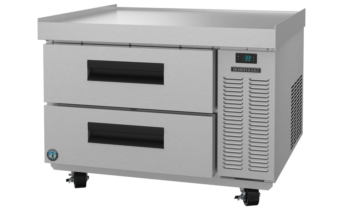 A stainless steel refrigeration undercounter Hoshizaki model featuring two pull-out drawers, a digital temperature display at 33°F, ventilation grilles, and four caster wheels. Ideal as a refrigerated equipment stand in any commercial kitchen.