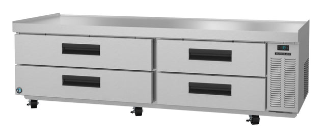 The Hoshizaki CR85A stainless steel refrigerated equipment stand features four large drawers with black handles, a digital temperature display, side vents, mobility wheels, and a flat top—ideal for any busy commercial kitchen.