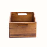 A rectangular acacia wood display crate with a smooth finish, open at the top, featuring two oval-shaped handle holes on opposite sides. The crate is empty and displayed against a plain white background.