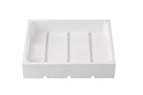 A white, rectangular plastic tray with raised edges and three recessed grooves on the flat base. Inspired by the simple, modern design of a half size Gastronorm Crate, it features three small rectangular slots on one side against a plain white background.