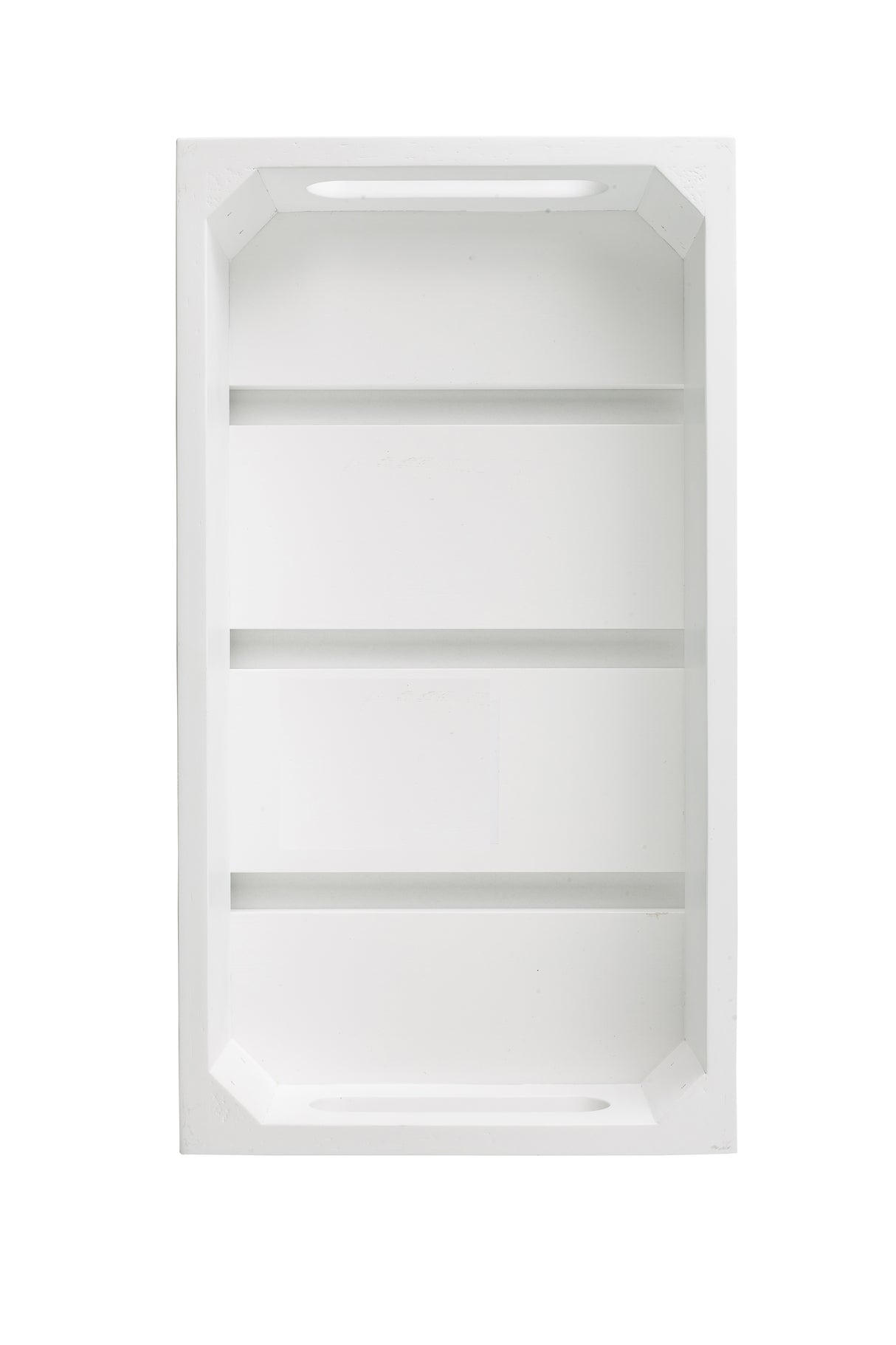 A white, rectangular recessed wall shelf with three horizontal shelves and beveled edges. The design is minimalistic, similar to a TableCraft wood crate, and the empty background emphasizes its clean lines and geometric shape.