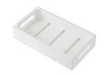 A rectangular white wooden tray by TableCraft, featuring cut-out handles on each short side and three slats on the base. The tray is empty and photographed on a white background, viewed from an angled top-down perspective.