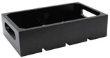 A rectangular black rubberwood crate with open sides and two oval cut-out handles. The box features a solid base with three short, rectangular feet and smooth, polished surfaces. It is empty and positioned at an angle against a white background.
