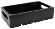 A rectangular black rubberwood crate with open sides and two oval cut-out handles. The box features a solid base with three short, rectangular feet and smooth, polished surfaces. It is empty and positioned at an angle against a white background.