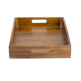 A rectangular acacia wood display crate with raised sides and two oval cutout handles on the shorter ends. The medium brown finish highlights visible grain patterns, giving this sturdy tray a polished look. Photographed on a white background.
