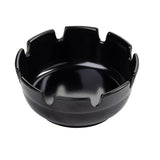 A glossy black plastic ashtray with a smooth surface and six evenly spaced notches along the rim for holding cigarettes. The interior is shiny and reflective, while the exterior is matte and plain. This economy ashtray is empty and set against a white background.