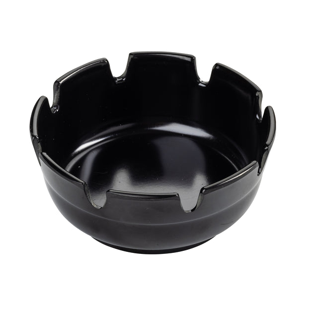 A glossy black plastic ashtray with a smooth surface and six evenly spaced notches along the rim for holding cigarettes. The interior is shiny and reflective, while the exterior is matte and plain. This economy ashtray is empty and set against a white background.