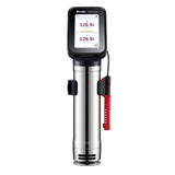 A sleek Breville Commercial Sous Vide Immersion Circulator with a digital display showing 126.9°F. The stainless steel HydroPro Plus features a black touchscreen top and a red clamp for secure pot attachment.