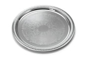 A 13 inch chrome plated serving tray with an ornate braided border. The flat surface features intricate, engraved floral and scrollwork patterns, giving it an elegant, decorative appearance and a shiny, reflective finish.