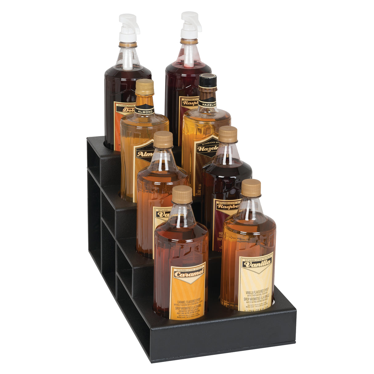 Eight assorted syrup bottles, arranged in two rows on a black polystyrene display stand. This countertop bottle organizer features three steps, holding each bottle securely with labels and pump dispensers, showcasing syrups from amber to dark brown.