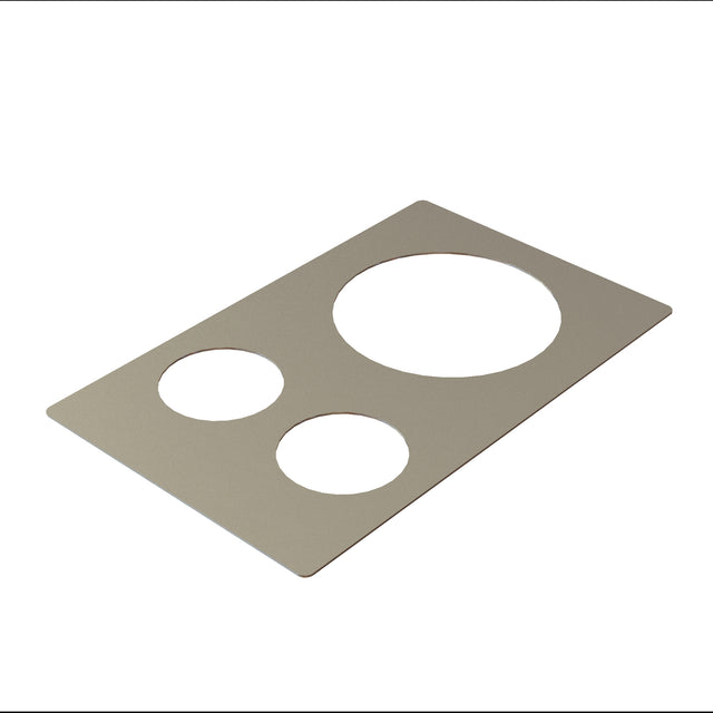 A rectangular, flat, gray Hot Food Template made of stainless steel with three circular holes of varying sizes arranged diagonally; the largest hole is in the upper right. Dishwasher safe, set against a plain white background.