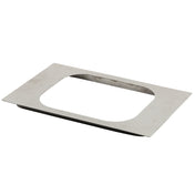 A flat, rectangular stainless steel plate with a large rounded rectangular cutout in the center. The surface has a subtle, grid-like textured pattern. Thin and photographed on a white background, this Hot Food Template is dishwasher safe.
