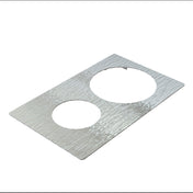 A rectangular sheet of textured stainless steel with two circular cutouts—one large and one smaller—arranged diagonally. The wavy, embossed surface is both stylish and dishwasher safe. The background is plain white.