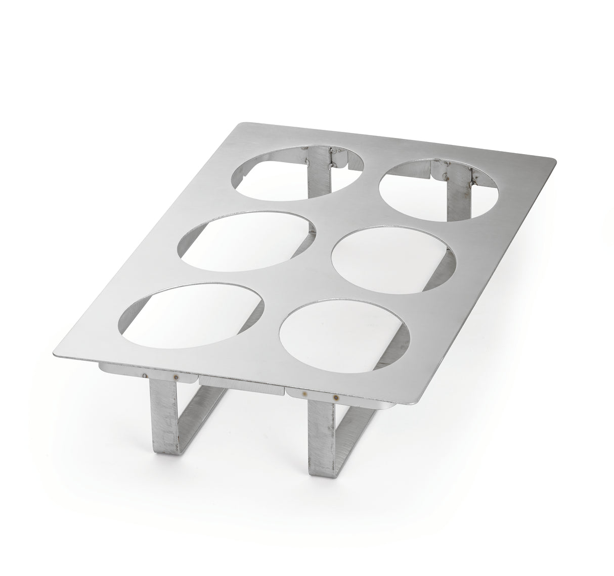 A full size stainless steel rack with six large circular cutouts and four supporting legs, designed to hold items such as jars or cups upright. The smooth, reflective cold food template is rectangular and elevated from the surface.