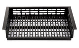 A black metal grill basket with rectangular perforations and a flat base, designed for grilling vegetables or small foods. Its cast aluminum construction allows heat and smoke to circulate while preventing food from falling through.