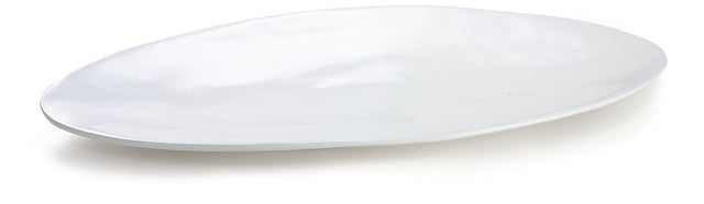 A large, glossy white ceramic platter with an irregular, organic oval shape and gently curved edges, photographed on a plain white background.