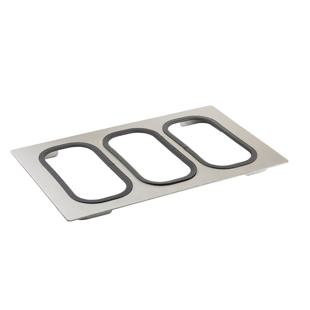 A rectangular stainless steel tray from the Tri-Ply Serveware Templates collection, featuring three large rounded rectangular cutouts with black rubber or silicone edges. The tray is angled to showcase its flat, smooth, and dishwasher safe design.