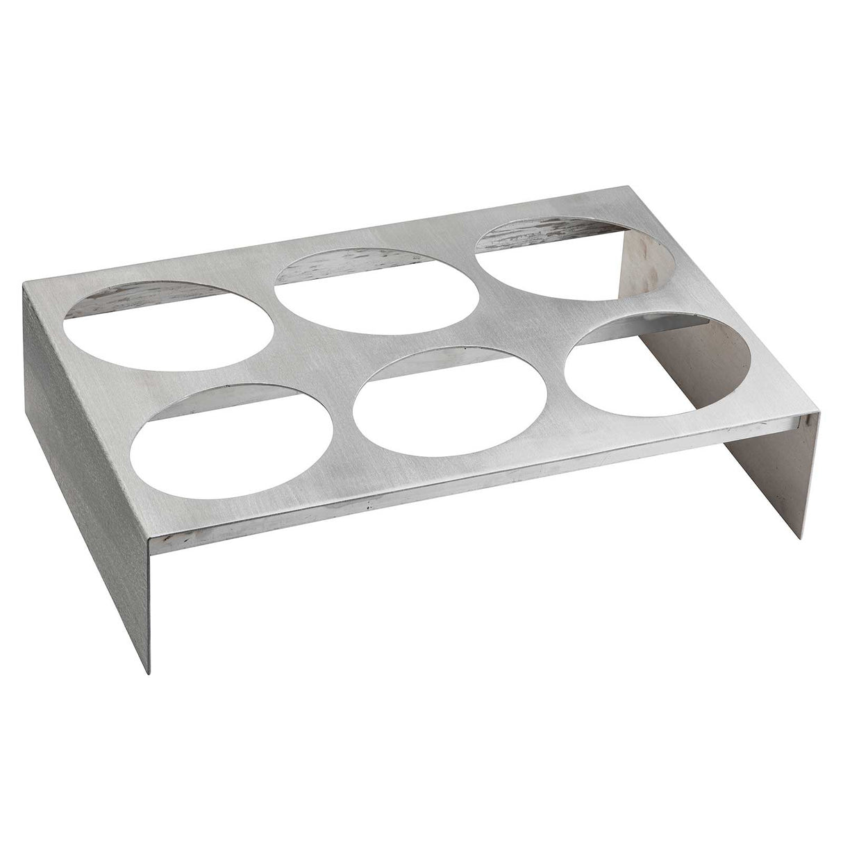 A stainless steel taco holder from TableCraft Products with six circular cutouts, designed to hold tacos upright. Its angled, rectangular structure features two legs for stability, and the brushed metal finish adds a sleek touch to any table setting.