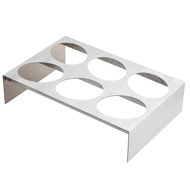 A rectangular stainless steel holder from TableCraft Products with six circular cutouts on the brushed top surface, elevated by side panels—ideal for organizing condiment bottles or cups. Functions as an efficient dressing template for busy kitchens.