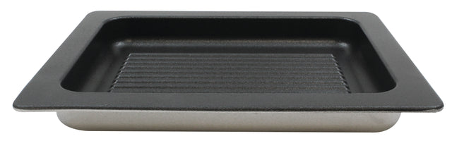 A rectangular, black, non-stick cast aluminum grill pan with a ridged bottom and wide, flat edges, shown against a white background. The raised ridges collect juices below, making it ideal for grilling or roasting meats.