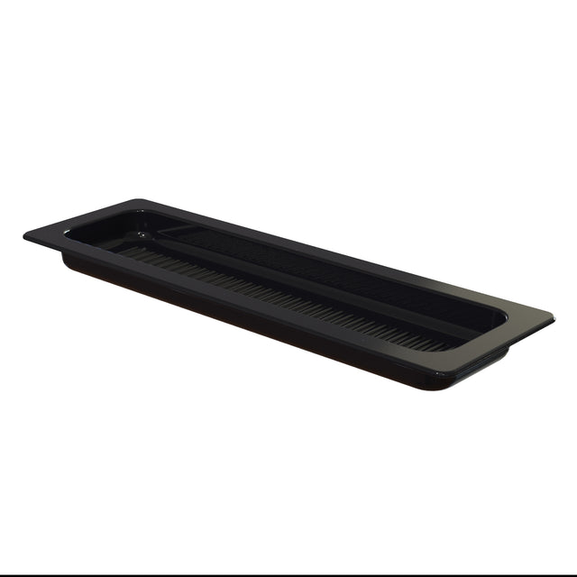 A rectangular, black cast aluminum tray with a shallow depth and grid-like pattern on the bottom, viewed from a slight angle. The tray has a wide rim and a small, raised compartment in one corner. The background is completely white.