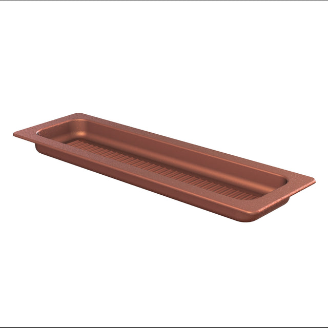 A rectangular, cast aluminum tray with a copper finish features a raised, textured base and flared edges. Shallow and elongated, it's perfect for organizing or serving long items. Photographed on a white background.