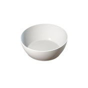 A plain, empty white ceramic Bowl is centered on a white background, casting a subtle shadow. The bowl’s smooth, curved sides and minimalist design make it ideal for cold holding or pairing with cast aluminum serveware.