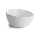 A plain, oval-shaped bowl is shown on a white background. Crafted for cold holding, this white ceramic piece features smooth, slightly curved sides and a glossy finish. Its simple and modern design remains free from patterns or decorations.