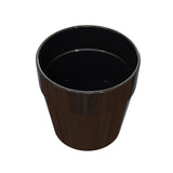 A black, glossy, cylindrical condiment crock viewed from above against a white background. The cup appears empty and its reflective surface highlights its smooth texture, with slight reflections along the rim and sides.