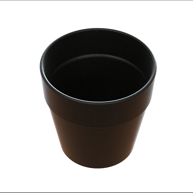 A black, empty, cylindrical cast aluminum plant pot with a slightly flared rim and a smooth matte finish is shown against a plain white background, viewed from above at an angle.
