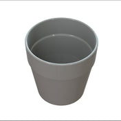 A plain, empty, glossy gray flower pot is shown against a white background. The pot has a smooth surface, similar to cast aluminum, with a wide rim at the top and gently tapers toward the bottom. Lighting highlights its shiny, ceramic-like texture.