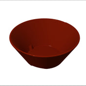 A deep, round, glossy red serving bowl is centered on a plain white background. The bowl has smooth sides and a simple, modern design with no visible patterns or decorations. Subtle reflections play across the cast aluminum bowl’s surface.