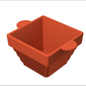 A 3D-rendered image of an orange, square condiment bowl with ribbed sides and two flat, rounded handles on opposite corners. The cast aluminum container is empty, viewed from above at an angle, revealing its open top and textured outer surface.