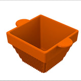 A 3D-rendered orange, square-shaped basket with rounded handles on two opposite sides and vertical grooves along the sides, resembling a stylish cast aluminum condiment bowl, set against a plain white background.
