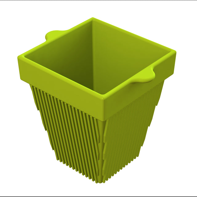 A green, square-shaped plastic basket with vertical slits on the sides is perfect for cold holding. The tapered base, smooth surfaces, and small handle tabs make it a practical choice for organizing items or pairing with a condiment bowl.