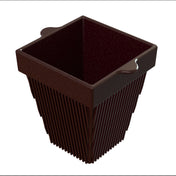 A dark brown, square-shaped cast aluminum planter with vertical ridges on the sides and two small handles on opposite edges of the rim, shown empty against a white background.