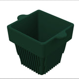 A dark green, square-shaped plastic pot with a wide rim and two small side tabs resembles a modern condiment bowl. The sides taper downward, and vertical ridges run along the lower half. The background is plain white.