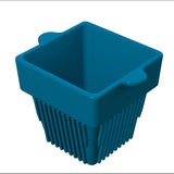 A blue, square-shaped plastic container with short side handles and vertical slits along the lower half, designed to resemble a small berry basket—ideal as a condiment bowl for cold holding. The container is shown on a white background.