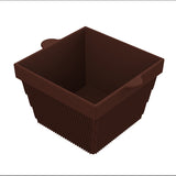 A brown, square-shaped silicone baking mold with ribbed sides and two small handles on opposite edges. The mold, shown empty against a white background, offers versatility much like a cold holding bowl for your baking needs.