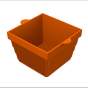 A square, orange cast aluminum bowl with vertical ridges on the exterior sides and two small, flat handles on opposite edges. This dishwasher safe bowl is open at the top and has a smooth interior. The image is rendered on a plain white background.