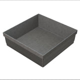 A square, gray, paper baking mold with straight, ribbed sides and a flat base. Its slightly rough texture is similar to that of a cold holding bowl, and the empty mold is viewed at an angle to show interior and exterior details.