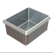A rectangular, silver cast aluminum baking pan with ribbed sides and smooth interior, viewed from a slightly angled perspective against a white background. The pan appears empty and clean.
